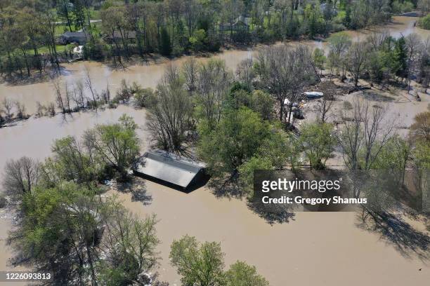 Aerial view of the Tittabawassee River after it breached a nearby dam on May 20, 2020 in Sanford, Michigan. Thousands of residents have been ordered...