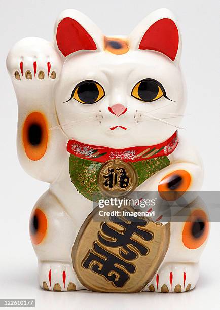 beckoning cat - maneki neko stock pictures, royalty-free photos & images