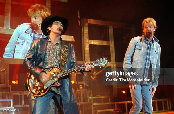 Kix Brooks and Ronnie Dunn of Brooks & Dunn perform during the "Neon Circus" tour at Shoreline Amphitheatre on May 23, 2003 in Mountain View,...