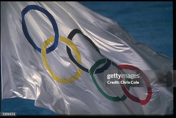 THE OLYMPIC FLAG IS SHOWN IN ALL ITS GLORY DURING THE CLOSING CEREMONY OF THE 1992 BARCELONA OLYMPICS.