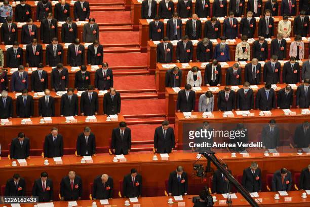 Chinese President Xi Jinping , Chinese Premier Li Keqiang and member of the Standing Committee of the Politburo Li Zhanshu and other attendees bow...