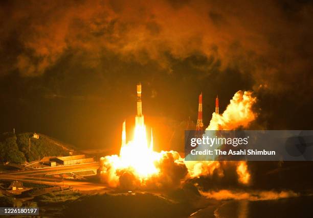 In this aerial image, the H-2B Launch Vehicle No. 9 carrying unmanned Kounotori 9 cargo spacecraft for the International Space Station lifts off from...