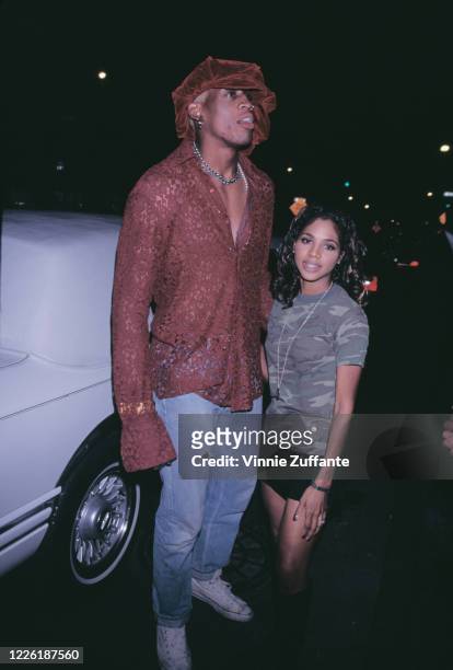 American basketball player Dennis Rodman and American singer Toni Braxton attend the Maverick Records after party at the Lemon Restaurant, following...