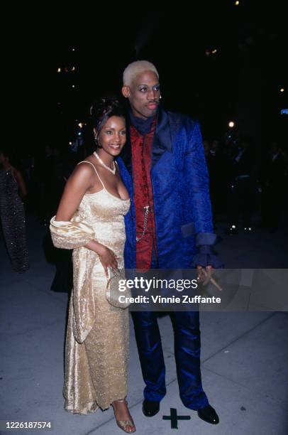 American actress Vivica A Fox and American basketball player Dennis Rodman attend the 4th Annual Vanity Fair Oscar Party, held at Morton's Restaurant...