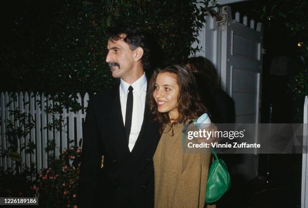 American musician and composer Frank Zappa with his daughter, American actress Moon Unit Zappa, circa 1990.