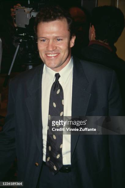 American actor Michael Rooker attends the premiere of 'JFK', held at the Mann Village Theater in Los Angeles, California, 17th December 1991.