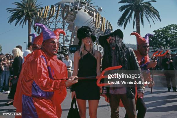 American actress Sheri Moon and her partner, American musician and filmmaker Rob Zombie attend the 1998 MTV Video Music Awards, held at the Gibson...