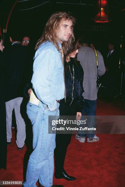 American tennis player Andre Agassi and his girlfriend Wendi Stewart attend the premiere of 'The Bodyguard', held at Mann's Chinese Theatre in Los...