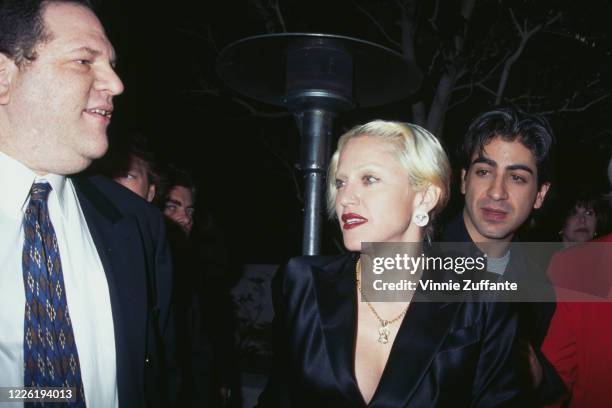 American film producer Harvey Weinstein, American singer Madonna, and Armenian film director Alek Keshishian attend the premiere of 'Ready to Wear',...