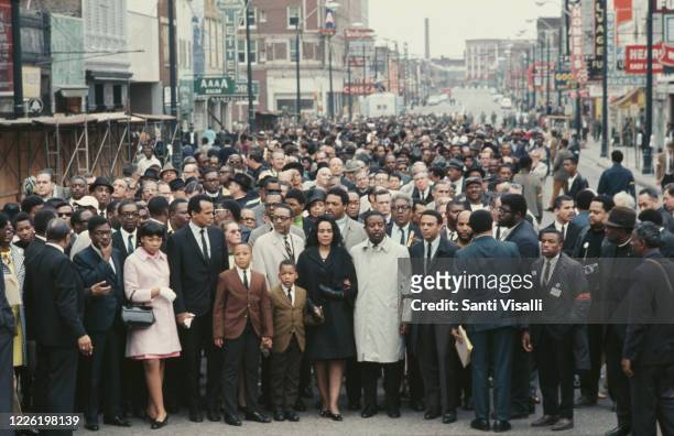 Crowds in Memphis, Tennessee, following the assassination of civil rights leader Martin Luther King Jr in the city, 8th April 1968. In the centre,...