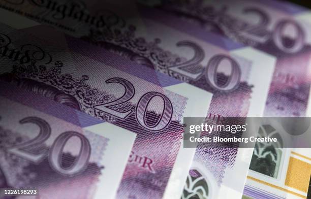 british twenty pound banknotes - polymer stock pictures, royalty-free photos & images