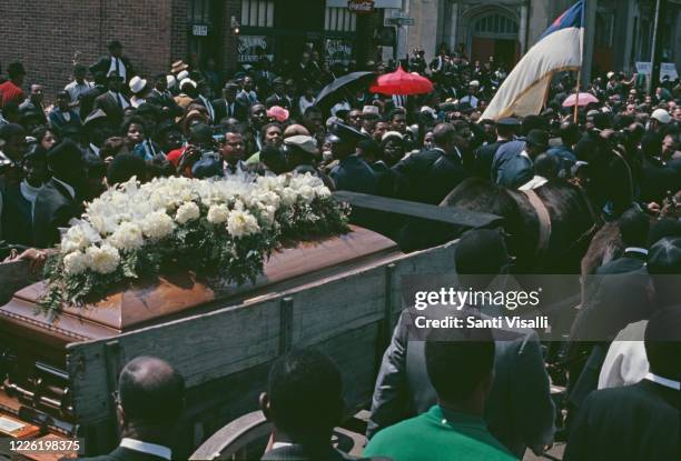 The procession bearing the coffin at the funeral of assassinated civil rights leader Martin Luther King Jr in Atlanta, Georgia, 9th April 1968.