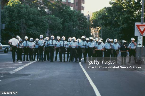 Police in Washington DC, during the riots which followed the acquittal of the four police officers who had arrested and beaten construction worker...