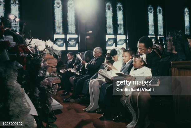 The deceased's brother, Reverend Alfred Daniel King , his widow Coretta Scott King, and his children Yolanda, Martin Luther III, Dexter and Bernice...