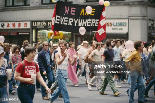 Banner reading 'We Are Everywhere' at a Gay Pride march on Fifth Avenue in New York City, USA, July 1979.