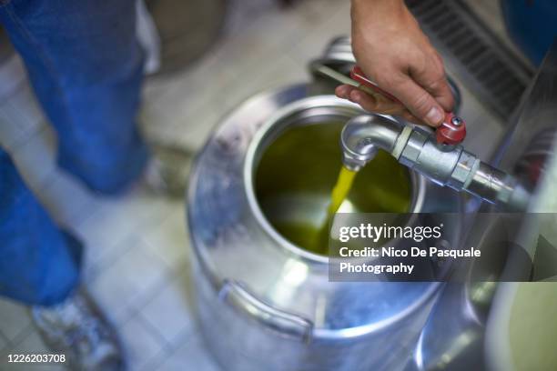 extra virgin olive oil production - olive oil ストックフォトと画像
