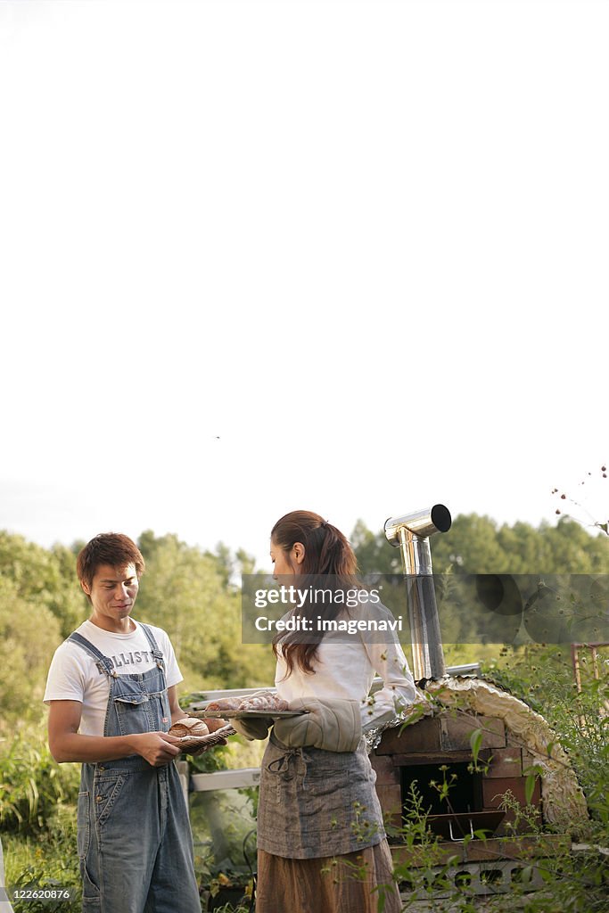 A couple baking home-made bread