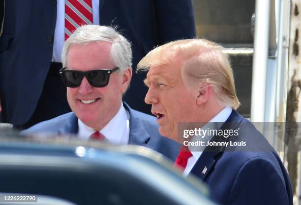 White House Chief of Staff Mark Meadows disembarks from Air Force One with U.S. President Donald Trump at Miami International Airport on July 10,...