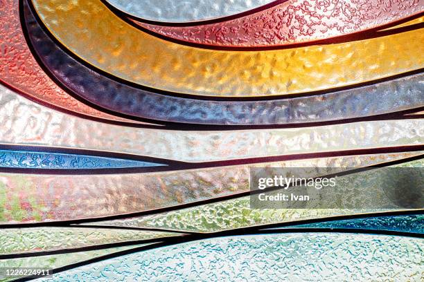 full frame of texture, multi color stained glass window - stained glass stockfoto's en -beelden