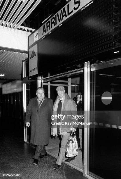 Dublin , Ireland - 11 February 1986; Jack Charlton, accompanied by Joe Delaney, assistant honorary treasurer of the FAI, arrives at Dublin airport...