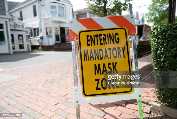 Seaside Vacation town Provincetown, Massachusetts, US, on July 10, 2020 is taking COVID-19 seriously mandating mask-wearing and limiting the number...