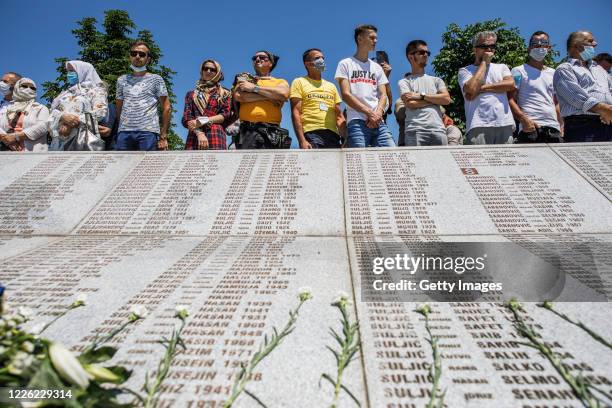 Mourners attend the funeral of victims of Srebrenica genocide on July 11, 2020 at the cemetery in Potocari near Srebrenica, Bosnia and Hercegovina....