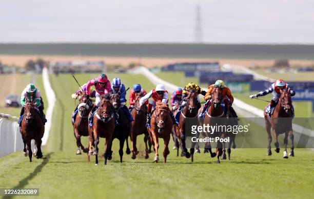 Oxted ridden by jockey Cieren Fallon wins the Darley July Cup Stakes during day three of The Moet and Chandon July Festival at Newmarket Racecourse...