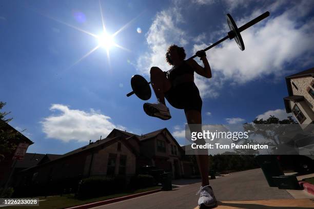 Two-time Olympic gold medalist track-and-field sprinter Natasha Hastings works out at home on May 20, 2020 in Cedar Park, Texas. The U.S. Trials and...
