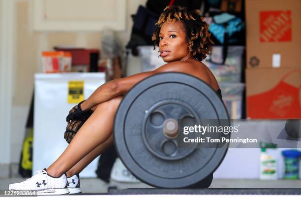 Two-time Olympic gold medalist track-and-field sprinter Natasha Hastings works out at home on May 20, 2020 in Cedar Park, Texas. The U.S. Trials and...