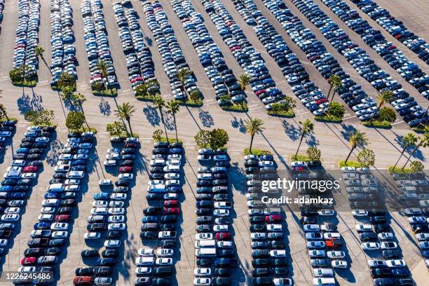 aerial view of parked cars - car dealership covid stock pictures, royalty-free photos & images