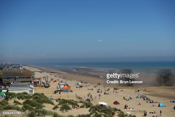 General view of Camber Sands beach on May 21, 2020 in Camber Sands, United Kingdom. The British government has started easing the lockdown it imposed...