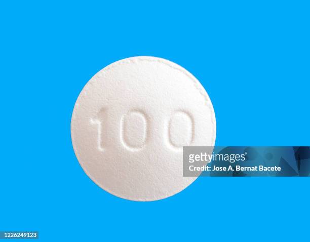 medicine pill on a blue background. - generiskt läkemedel bildbanksfoton och bilder