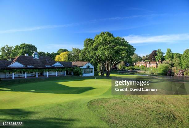 The green on the par 5, 14th hole with the clubhouse behind and the green on the par 4, 18th hole to the right at Woking Golf Club on May 20, 2020 in...
