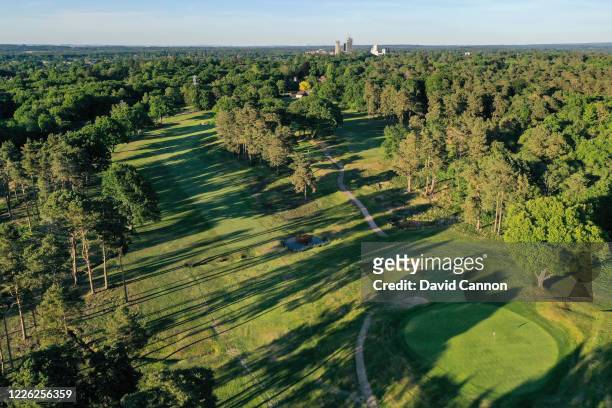 An aerial view of the par 4, third hole and the par 3, second hole at Woking Golf Club on May 20, 2020 in Woking, England. The British government has...