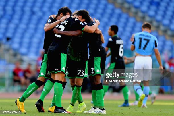 Sassuolo players celebrate their victory after the Serie A match between SS Lazio and US Sassuolo at Stadio Olimpico on July 11, 2020 in Rome, Italy.