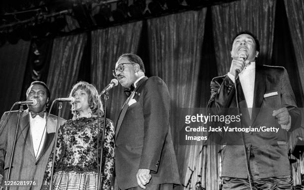 American R&B and Soul singer Smokey Robinson performs with the Miracles onstage during the Rhythm & Blues Foundation's 8th annual Pioneer Awards at...