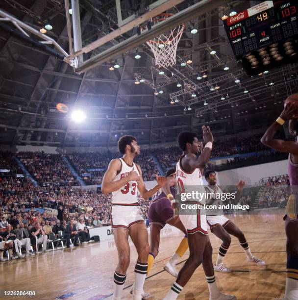 The Milwaukee Bucks' Kareem Abdul-Jabbar, Bob Dandrige and Oscar Robertson play defense against the Los Angeles Lakers and Wilt Chamberlain on March...