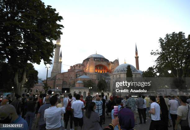 People visit the Ayasofya after the 10th Chamber of the Council of State's decision of the annulment of a 1934 Cabinet decision making Hagia Sophia â...