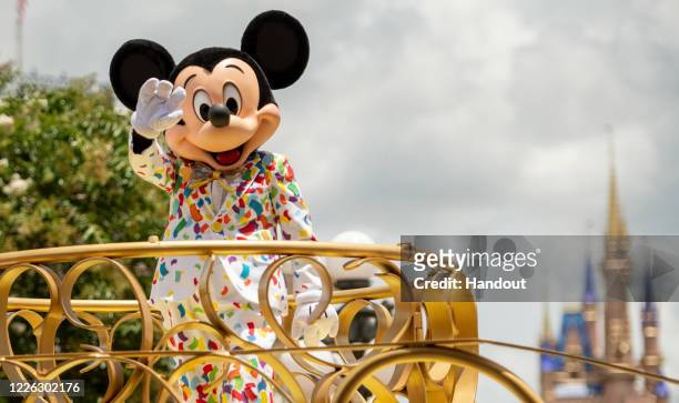 In this handout photo provided by Walt Disney World Resort, Mickey Mouse stars in the "Mickey and Friends Cavalcade on July 2, 2020 in Lake Buena...