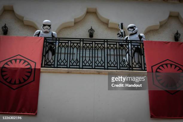 In this handout photo provided by Walt Disney World Resort, First Order Stormtroopers appear at Disney Springs at Walt Disney World Resort on May 27,...