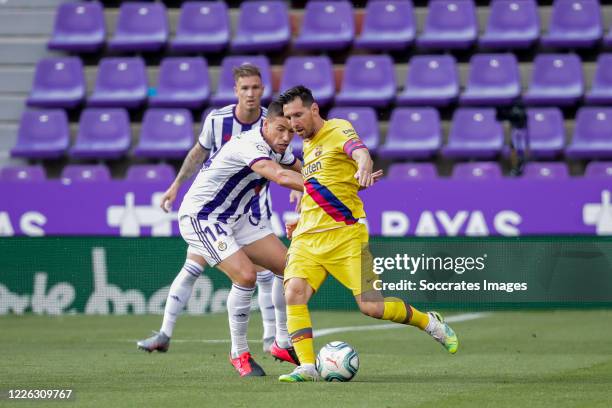 Alcaraz of Real Valladolid, Lionel Messi of FC Barcelona during the La Liga Santander match between Real Valladolid v FC Barcelona at the Estadio...