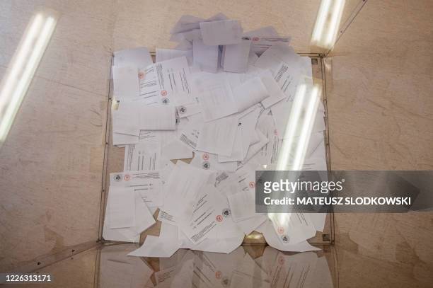 Voting ballots in a box are pictured on July 12, 2020 in Gdansk, Poland, during the second round of Poland's presidential election. Poles began...