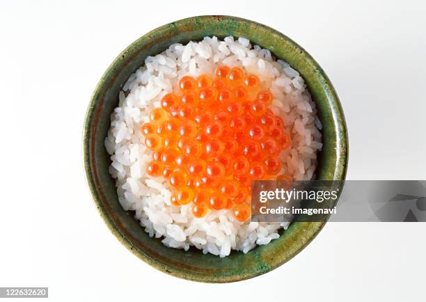 rice on salmon roe - ikura stock pictures, royalty-free photos & images