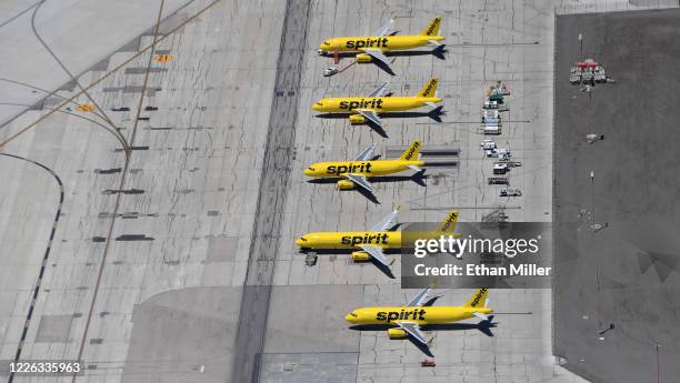 An aerial view shows Spirit Airlines jets parked at McCarran International Airport amid the spread of the coronavirus on May 21, 2020 in Las Vegas,...
