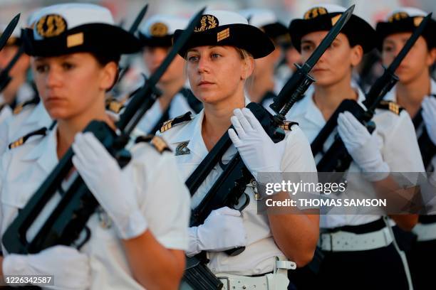 Members of the French military 'ecole du personnel paramedical des armees' practice their marching formation prior to the July 14 Bastille Day Parade...