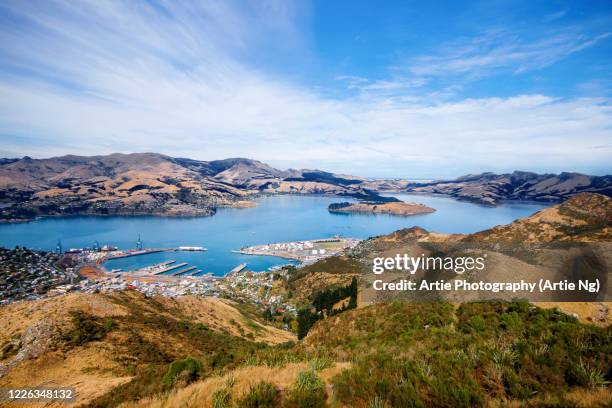 view of lyttelton harbour and quail island, south island, new zealand - christchurch fotografías e imágenes de stock