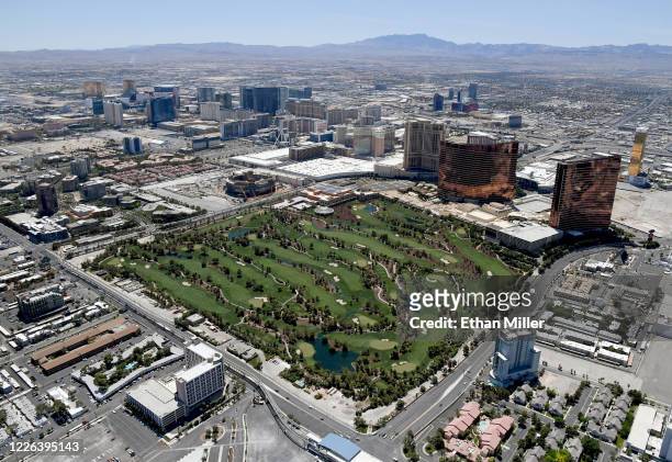 An aerial view shows the Las Vegas Strip including the Wynn Golf Club at Wynn Las Vegas, which has been closed since March 17 in response to the...