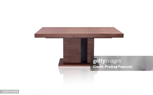 modern wooden brown dining table with black elements isolated on white - tisch frontal stock-fotos und bilder