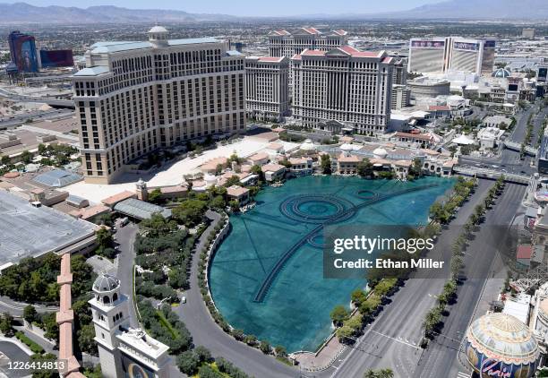 An aerial view shows Bellagio Resort & Casino and Caesars Palace, both of which have been closed since March 17 in response to the coronavirus...