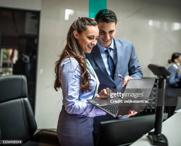 Hotel Receptionist Job Using Computer Hotel Worker On Computer Photos and Premium High Res Pictures - Getty ...